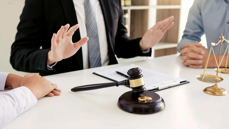 couple in a divorce mediation session with a lawyer