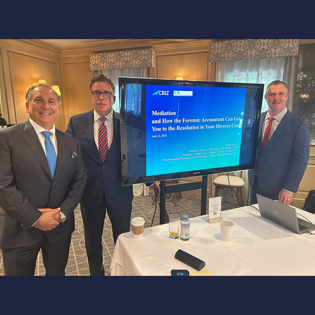 Frederic J. Siegel, Esq. and the Honorable Thomas D. Colin (Retired) at an event.